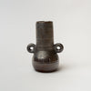 Black bud vase with loop accents on a white background