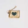 Small gold leather pouch with green appliqué heart and key ring