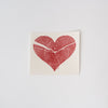 White Swedish cloth with red heart print on a white background