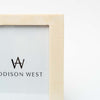 Close up of white Resin Photo Frame on a white background