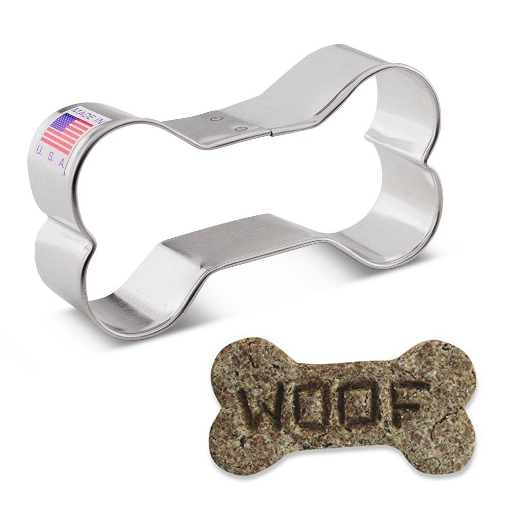 Dog bone shaped cookie cutter by Ann Clarke on a white background