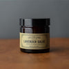 Los Poblanos brand lavender salve jar on a wood counter
