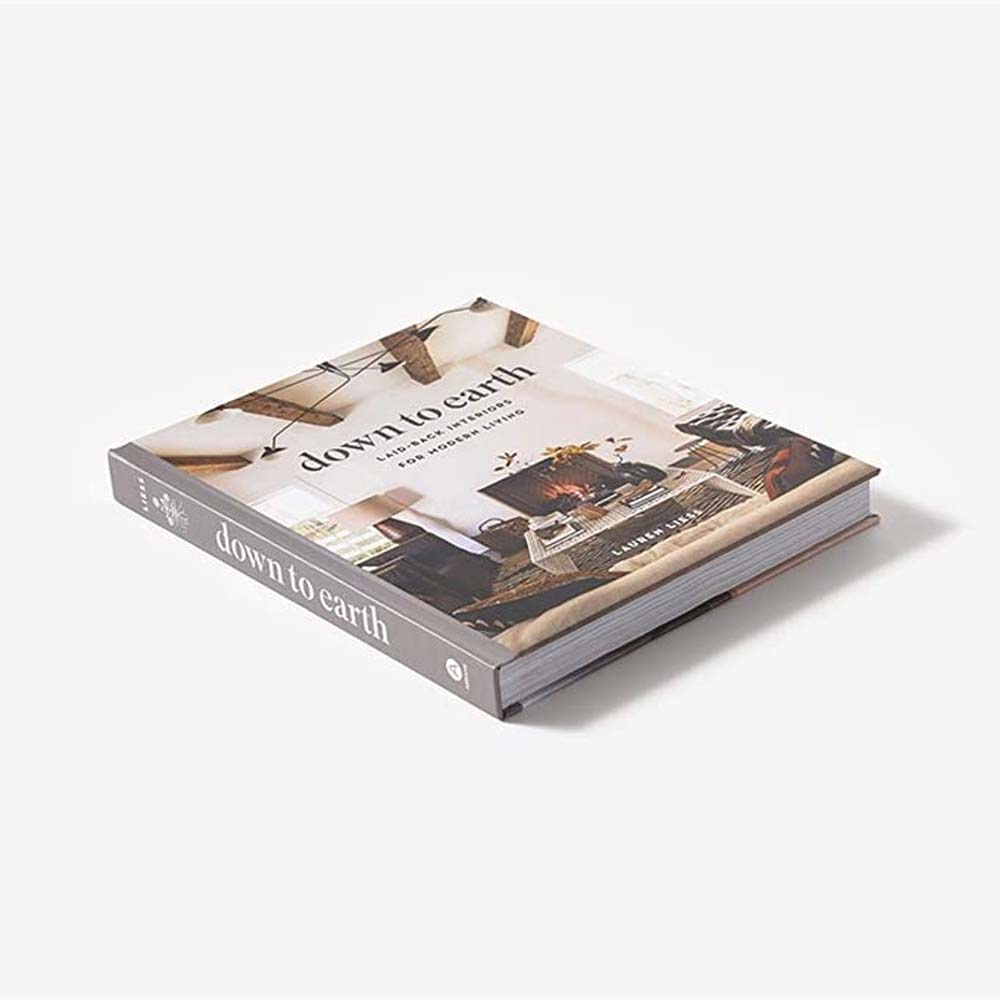 Side and top view of book 'Down to Earth' by Lauren Liess