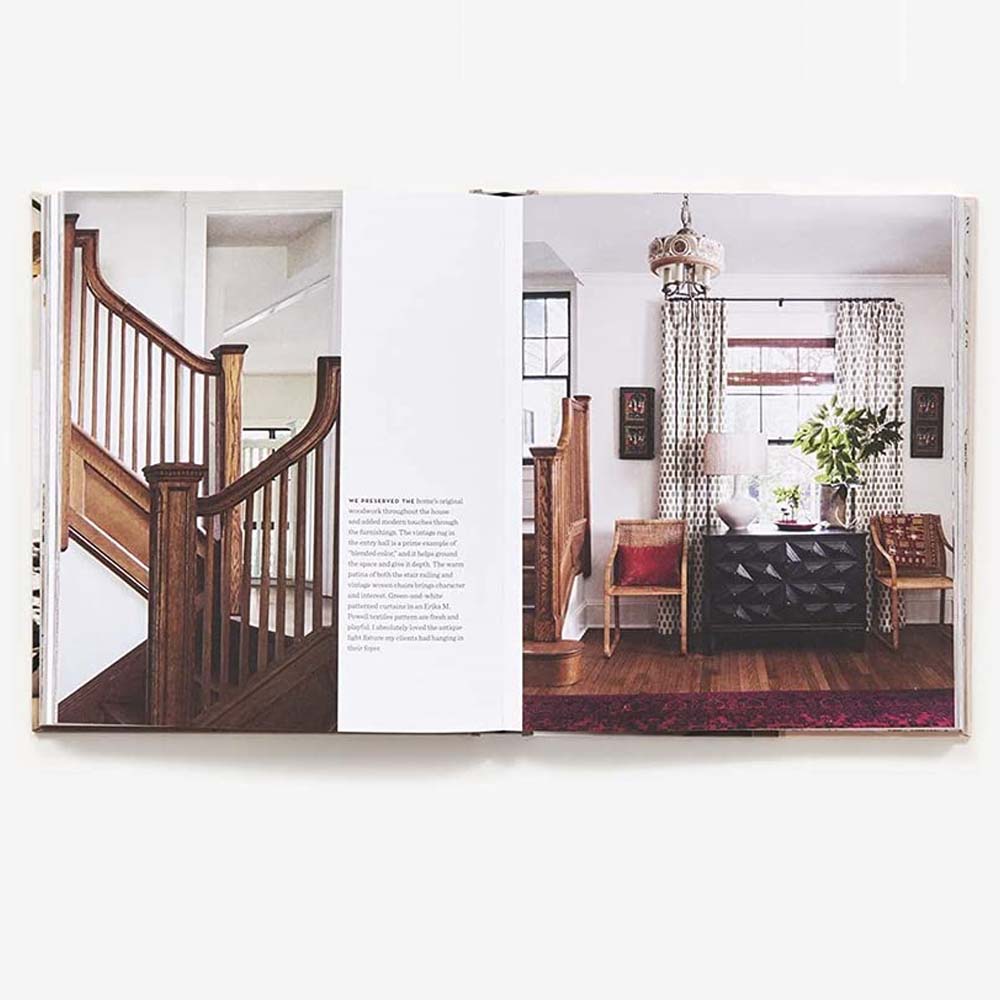 Inside pages of book 'Down to Earth' by Lauren Liess featuring wood staircase and sitting area with geometric bureau