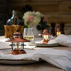 Table set with Barebones brand mini Edison lantern with vintage style and caged bulb