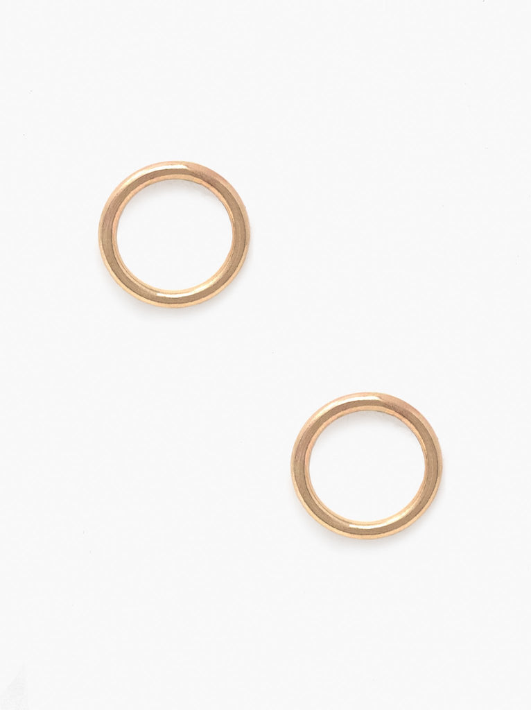 Able brand Celine studs in 14 carat gold fill on a white background