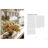 Inside pages of book Floret's Farm a Year in Flowers with  room with potting tools and large bouquet of pink flowers on a rough wood bench