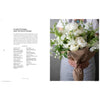 Inside pages of book Floret's Farm a Year in Flowers with woman holding large white bouquet of flowers in brown paper wrapped with twine 
