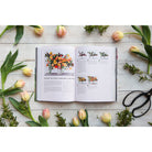 Inside pages of book titled 'cut flower garden' with large bouquet 
