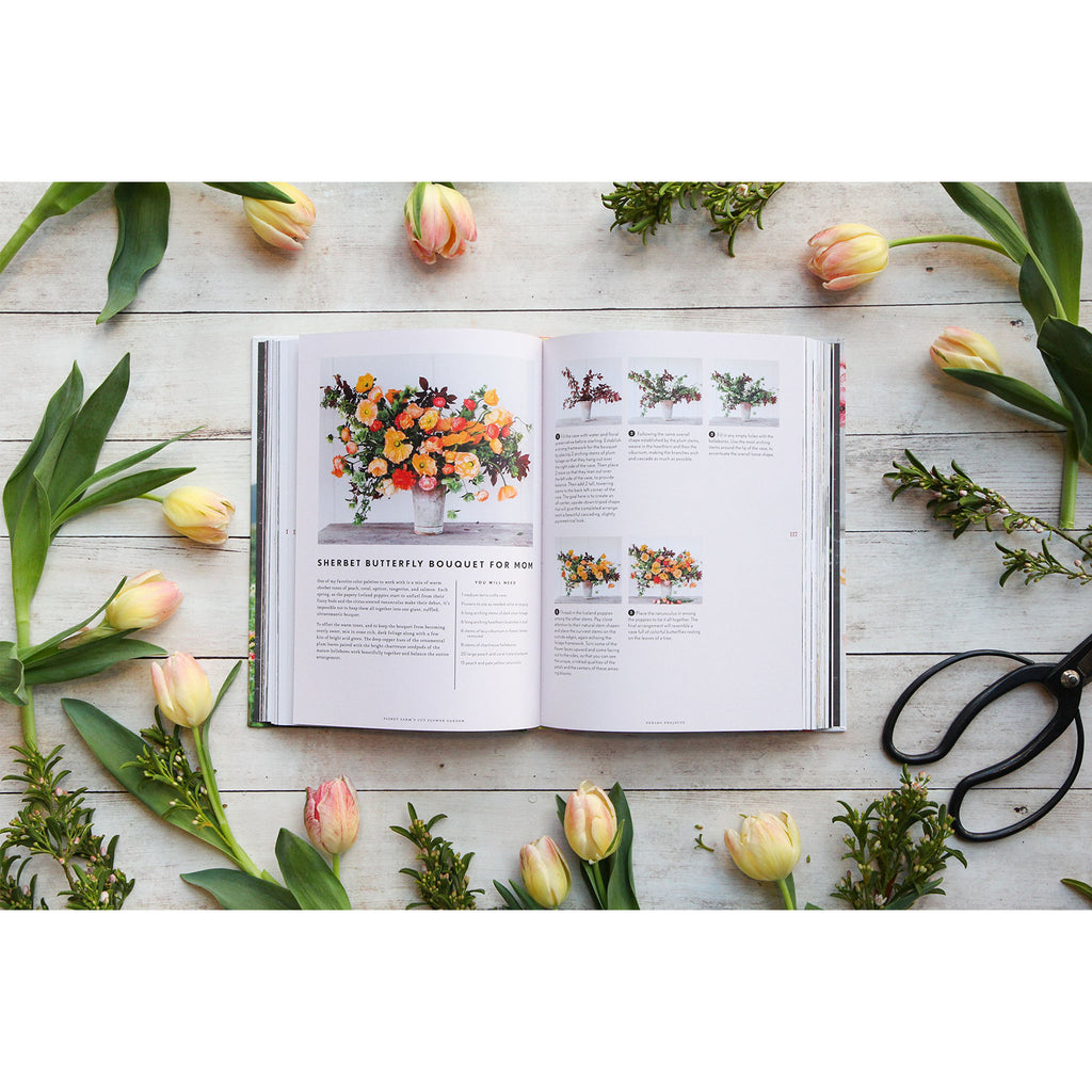 Inside pages of book titled 'cut flower garden' with large bouquet 