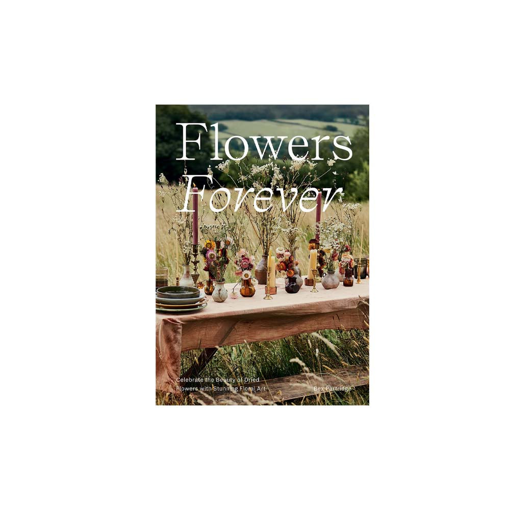Cover of book titled flowers forever showing dried flowers in vases on a dining table in a field 