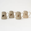 Four small pitchers with animals stamped on front including deer, squirrel, owl and porcupine