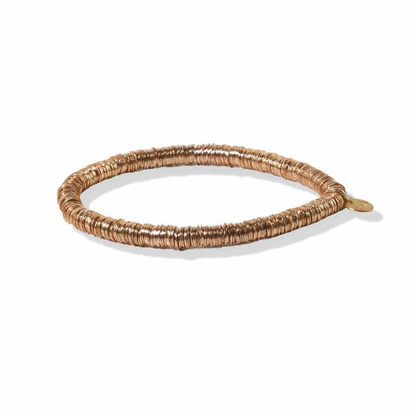 Ink and Alloy brand 'Grace' stretch bracelet in gold on a white background