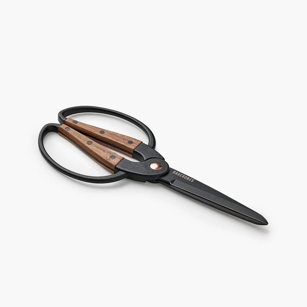 Barebones brand garden shears with ambidextrous black and wood handle on a white background