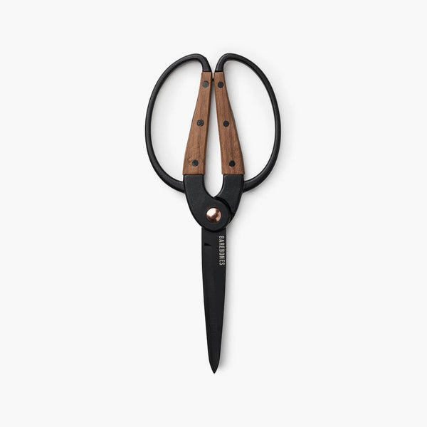 Barebones brand garden shears with ambidextrous black and wood handle on a white background