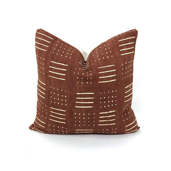 Brown and white African mud cloth 18x18 square throw pillow on a white background
