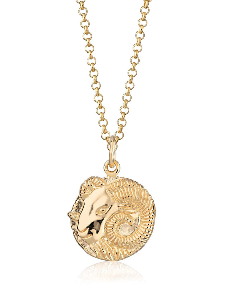 Scream Pretty brand gold Aries zodiac star sign necklace on a white background