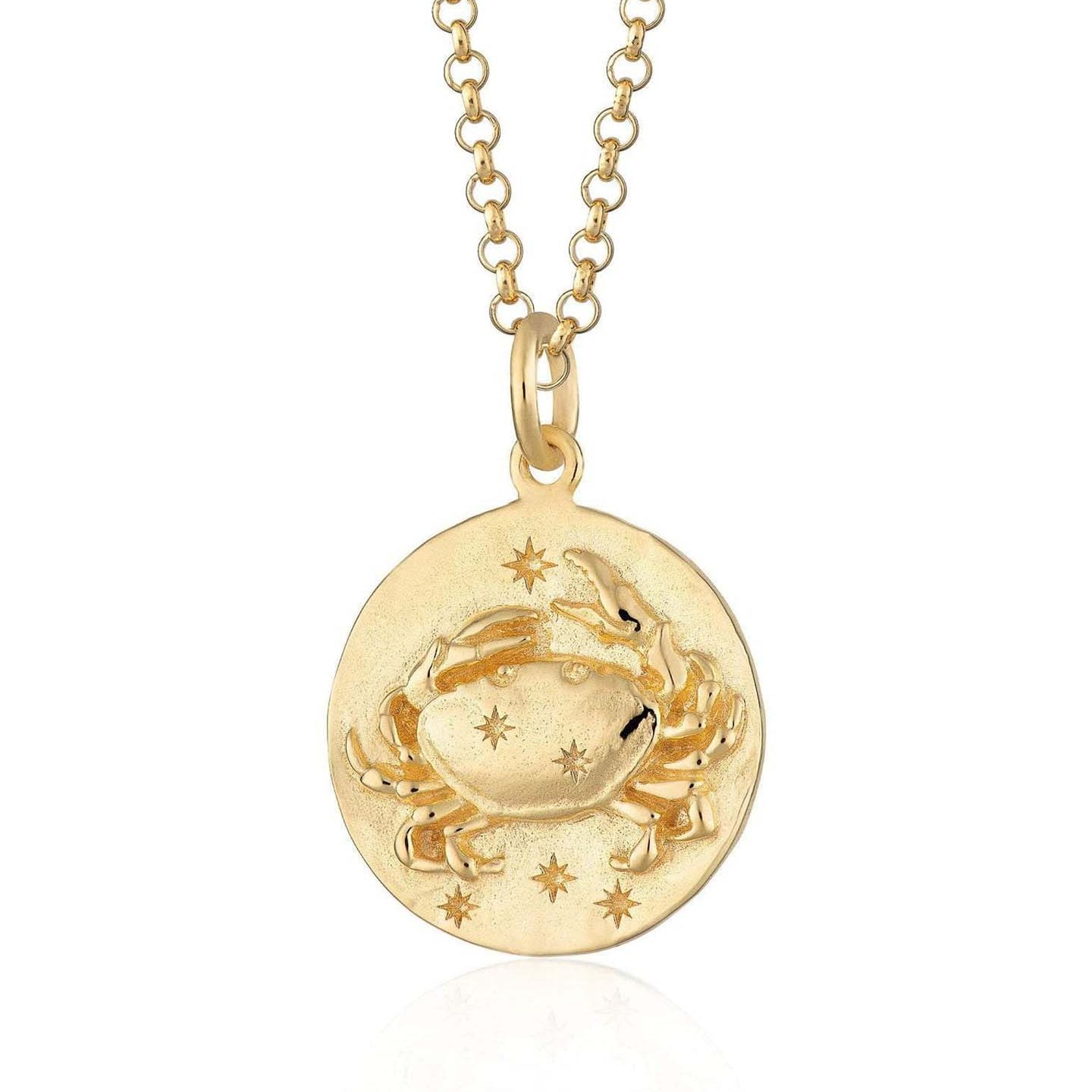Scream Pretty brand gold Cancer zodiac star sign necklace on a white background