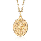 Scream Pretty brand gold Capricorn zodiac star sign necklace on a white background
