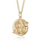 Scream Pretty brand gold Pisces zodiac star sign necklaces on a white background