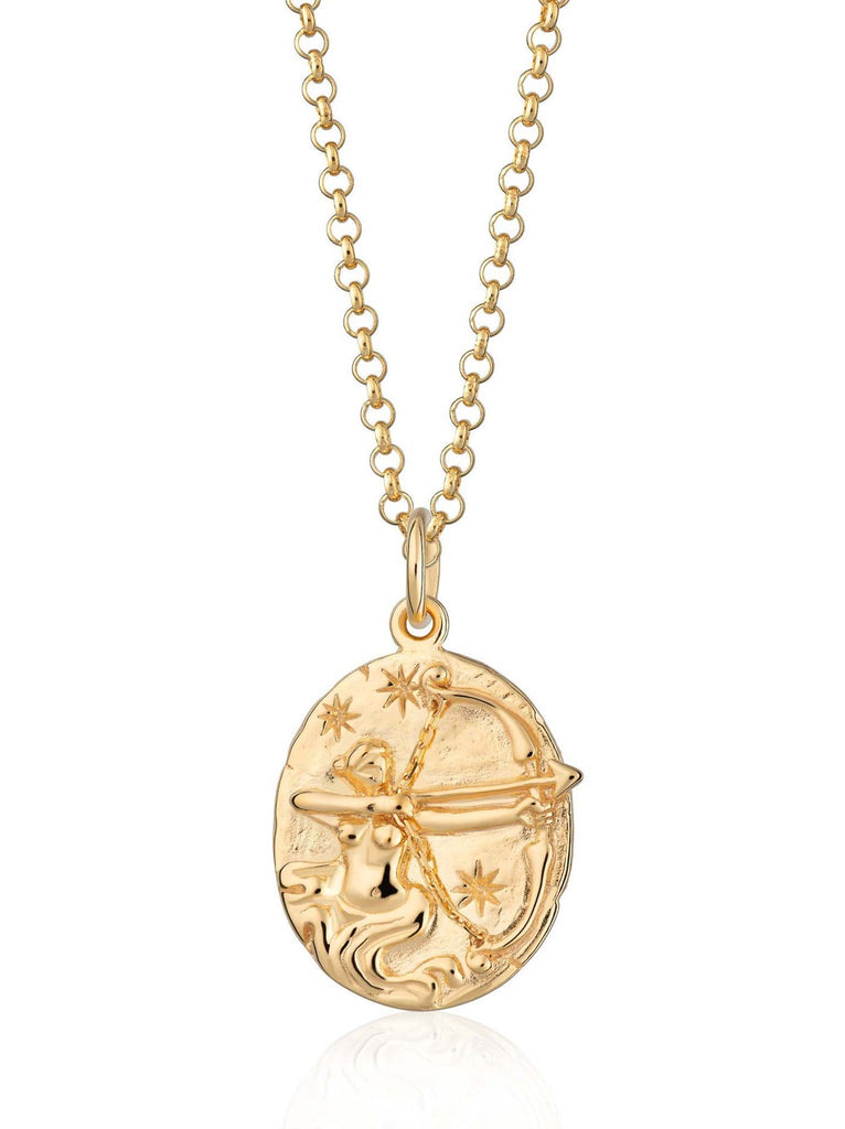 Scream Pretty brand gold Sagittarius zodiac star sign necklace on a white background