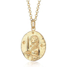 Scream Pretty brand gold Virgo zodiac star sign necklace on a white background