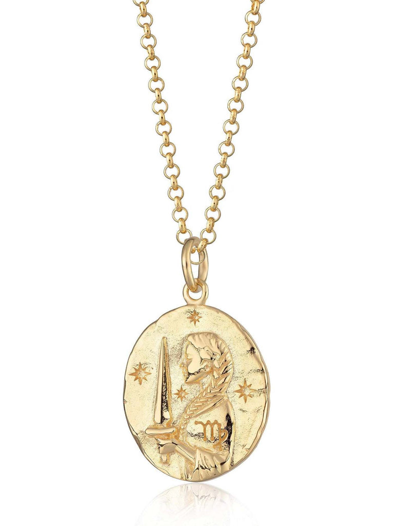 Scream Pretty brand gold Virgo zodiac star sign necklace on a white background