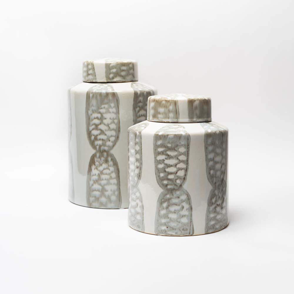 Set of two grey and white reactive glaze stoneware ginger jars by bloomingville on a white background