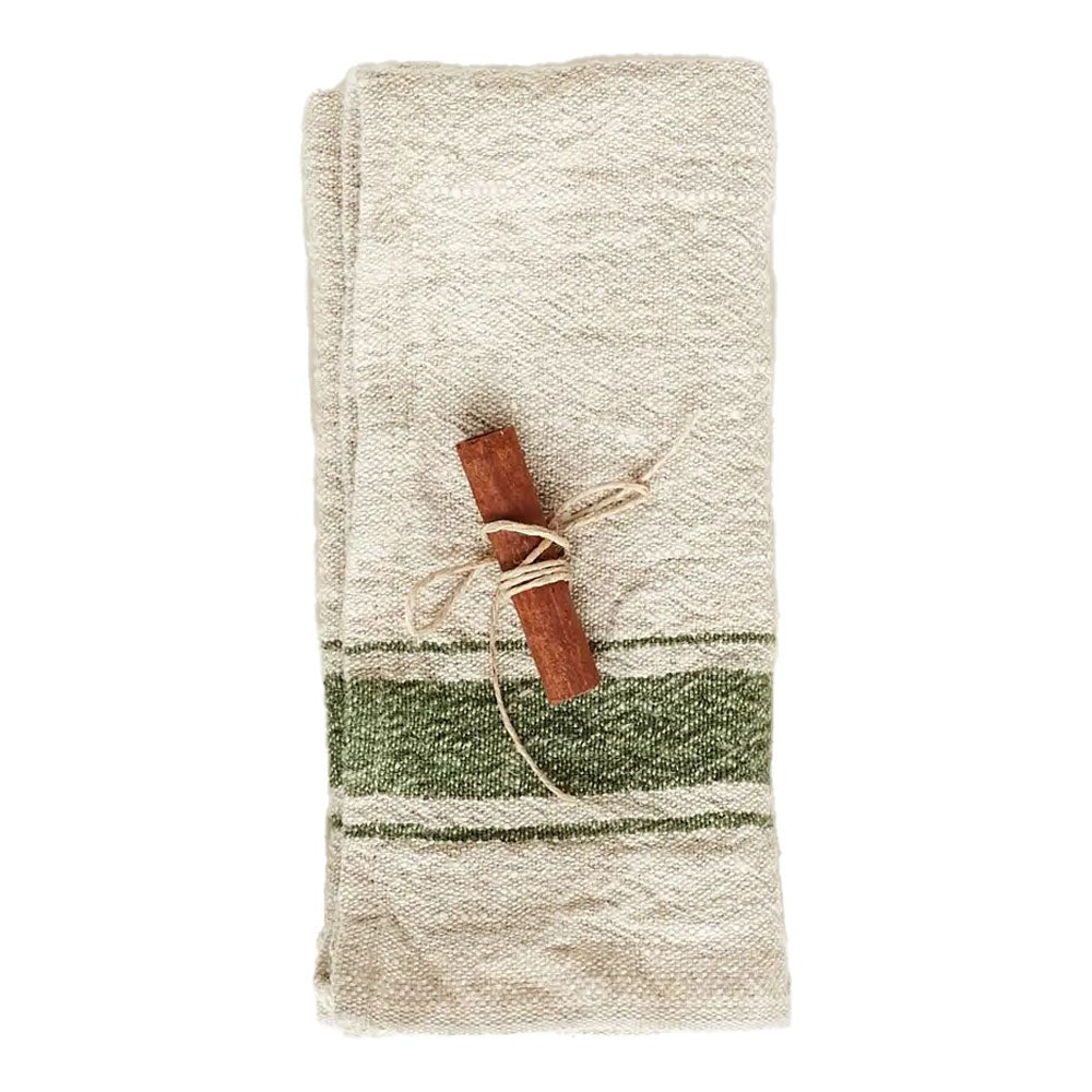 Natural linen napkin with green stripe on a white background