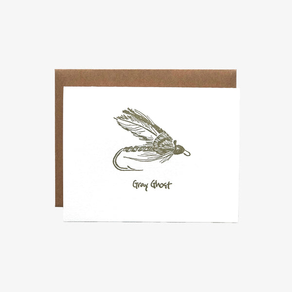 White greeting card with fly fishing lure and grey ghost printed in dark green