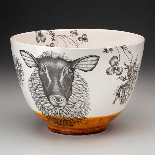 Laura Zindel large suffolk sheep bowl with amber rim on a grey background