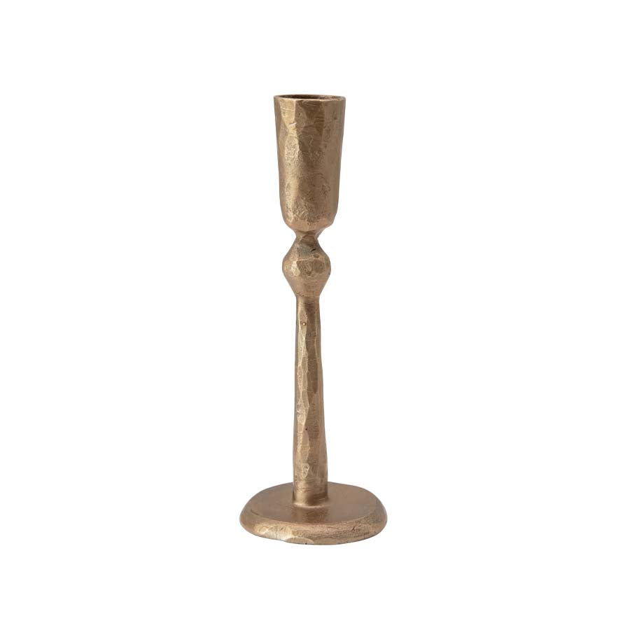 Creative coop antique brass hand-forged taper candle holder on a white background