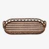 Thirty two inch long hand-woven rattan tray with handles and arched detailing on a white background