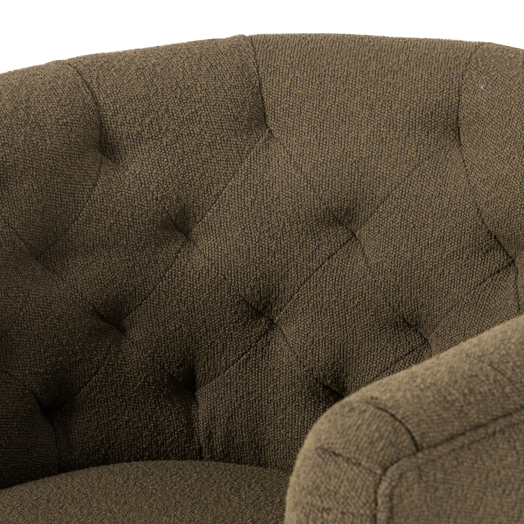 Barrel style 'Hanover' swivel chair upholstered in olive performance fabric by Four Hands furniture on a white background 