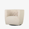 Barrel style 'Hanover' swivel chair upholstered in cream fabric by Four Hands furniture on a white background 