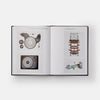 Inside pages of book titled 'Hi-Fi' with old recording equipment photo on a white background