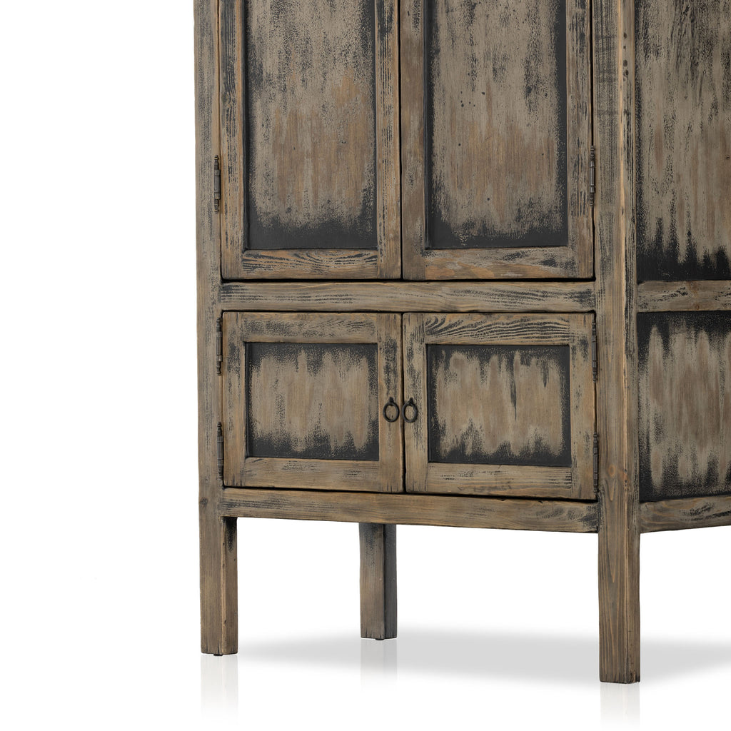Close up of detail on Tall 'Hitchens' cabinet with worn black paint and two doors on a white background by Four hands furniture