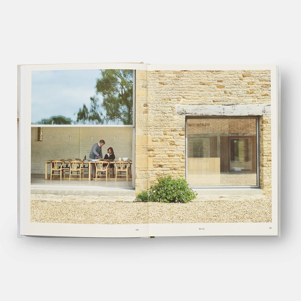 Inside pages of book titled 'Home Farm Cooking' with man and woman at outdoor table on a white background