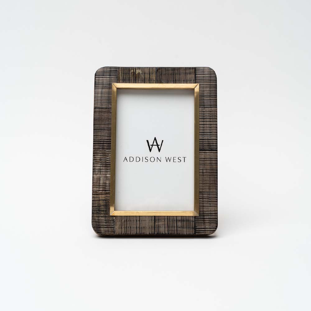 Hand-Carved Horn Photo Frame with Brass Border on a white background