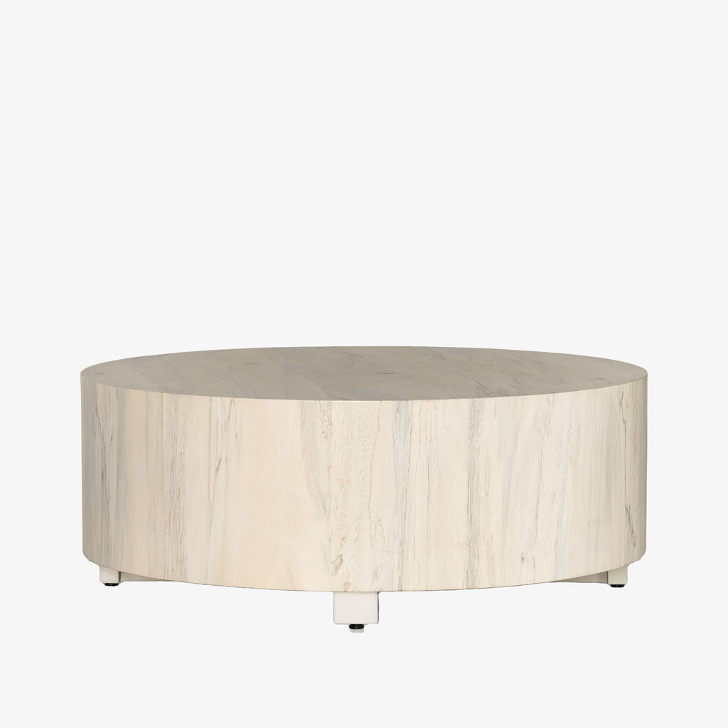 'Hudson' round coffee table by four hands furniture in light bleached spalted wood color on a white background