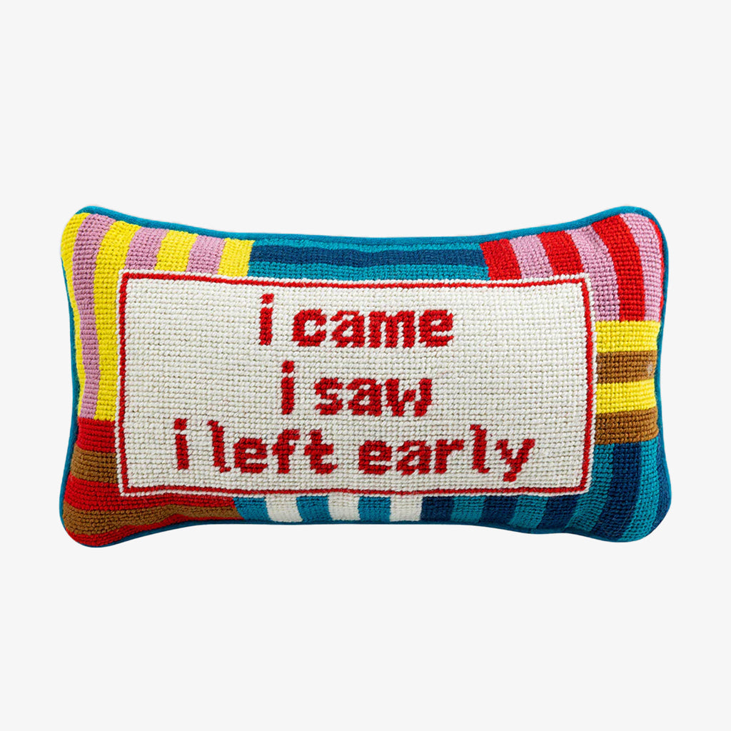 Needlepoint pillow by Furbish brand with bright colors and phrase 'I came I saw I left early' on a white background