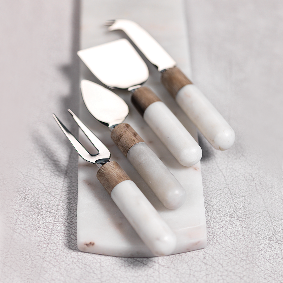 Marble and wood cheese board serving set of four on a marble tray 