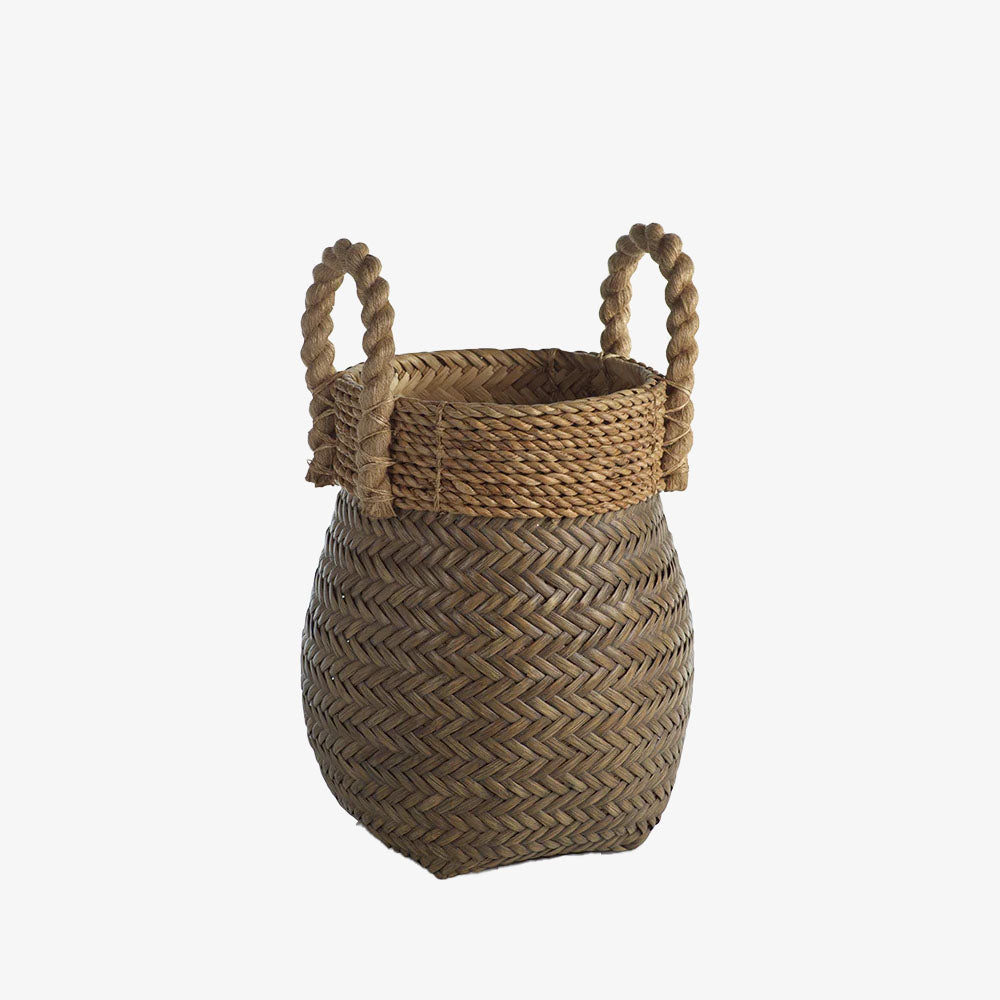 Zodax Isola rattan basket with rope handles on a white background