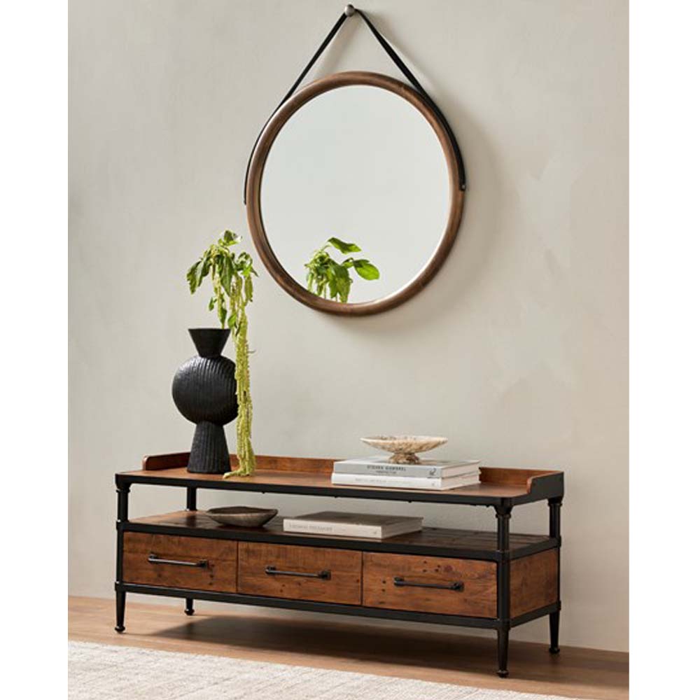 Four Hands Ivana Storage Entry Bench with wood and steel frame three drawers and bench seat in a rom with beige walls and wood floor