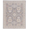 Jaipur wool JAIMAK rug with Pops of gold and dusty pink on gray backdrop with classic fringe 