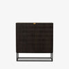 Kelby brown wood bar cabinet with carved doors and black iron frame base by four hands on a white background