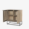 Kelby Light wood bar cabinet with carved doors and black iron frame base by four hands on a white background