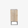 Side view of Kelby Light wood bar cabinet with carved doors and black iron frame base by four hands on a white background