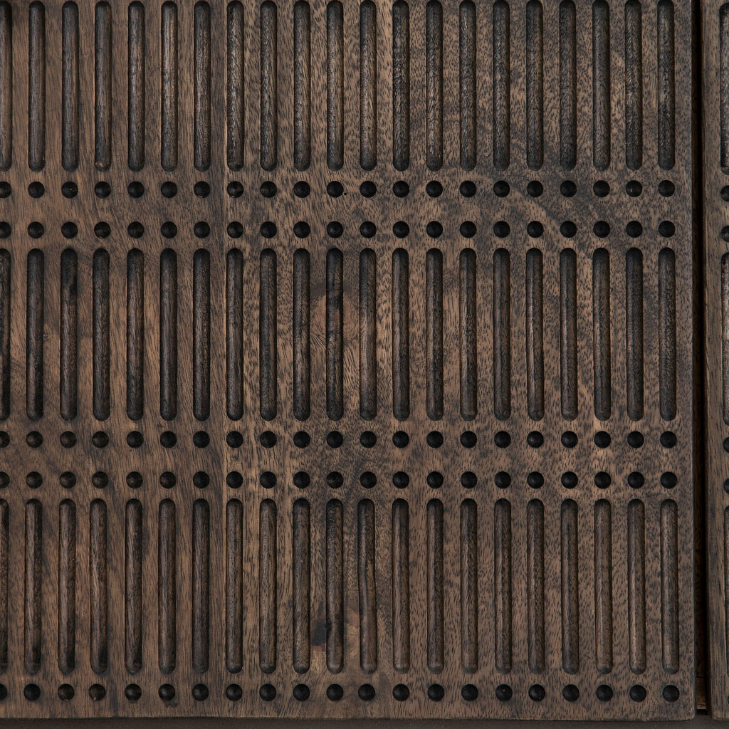 Close up of carved doors on Four hands furniture brand Kelby media console