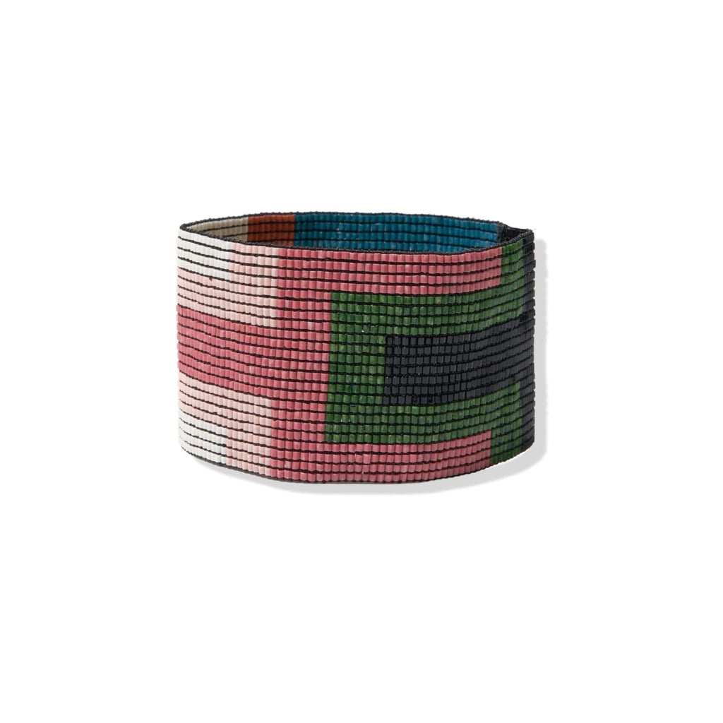 Ink and Alloy brand 'Brooklyn' beaded bracelet in green and pink with geometric shapes on a white background